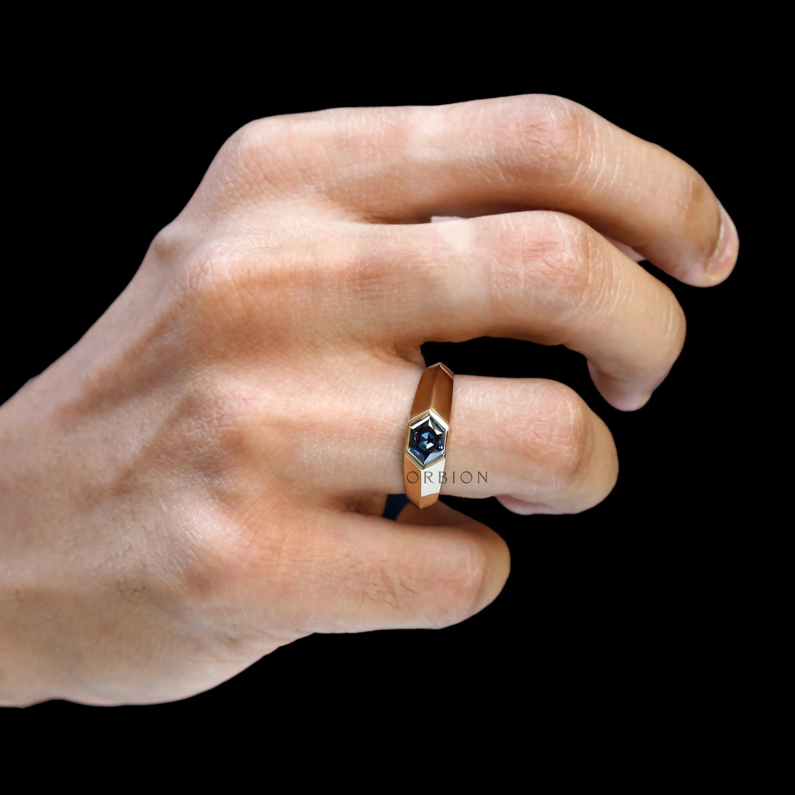 Men’s geometric hexagon moissanite ring worn on hand 