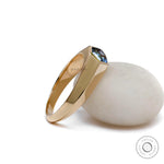 Glossy 18K yellow gold signet ring with knife edge detail 