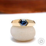 Men’s hexagon deep blue moissanite signet ring in 18K yellow gold front view  