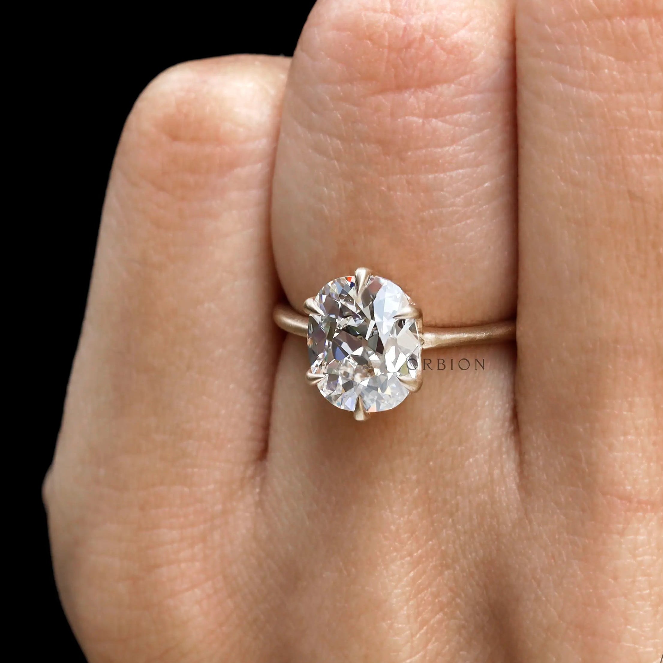 Classic antique inspired elongated cushion engagement ring close up
