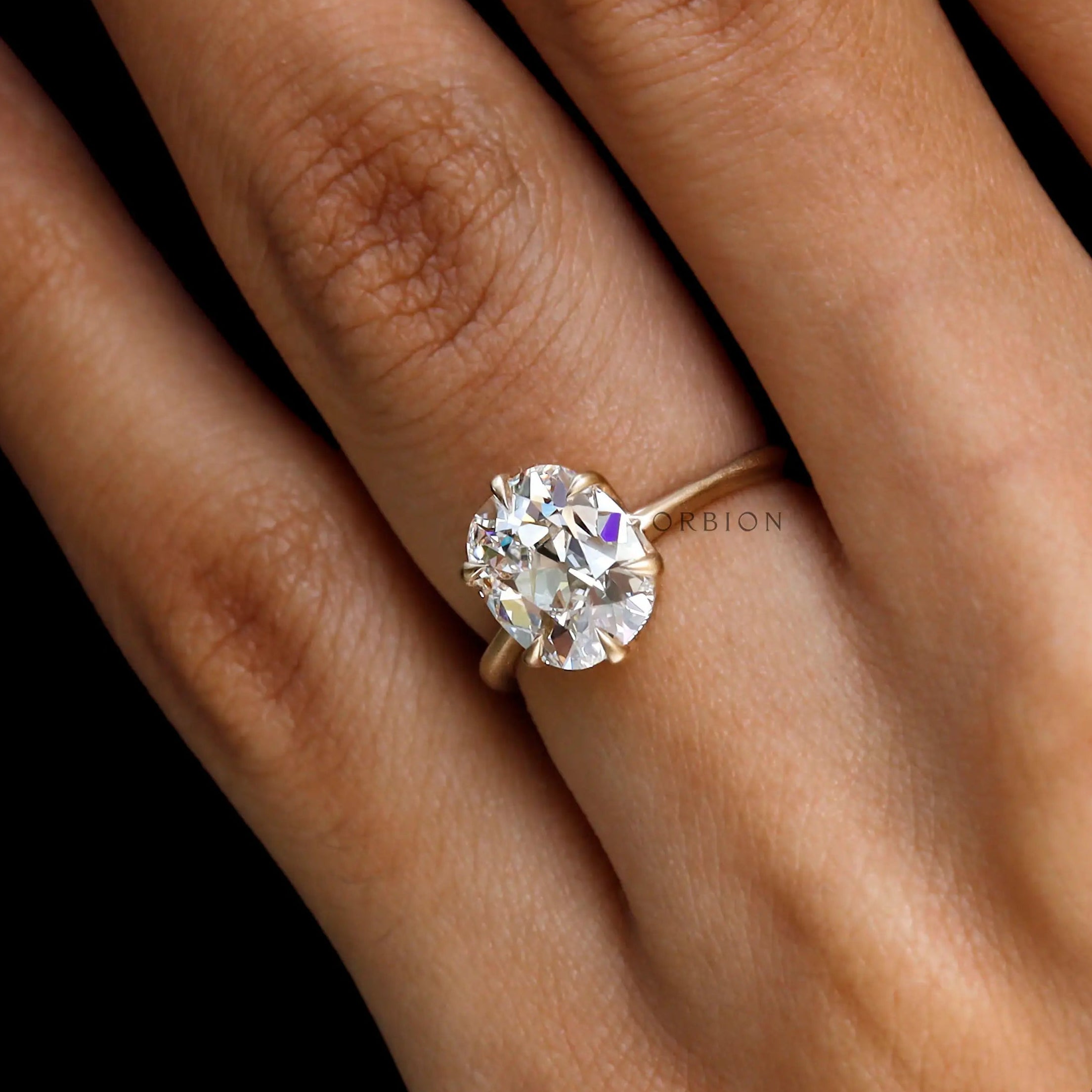 Solitaire cushion cut lab grown diamond vintage engagement ring close up