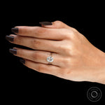 Vintage style lab diamond solitaire ring on finger