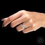 Elegant old mine cut moissanite ring on finger