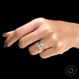 Elegant old mine cut moissanite ring on finger