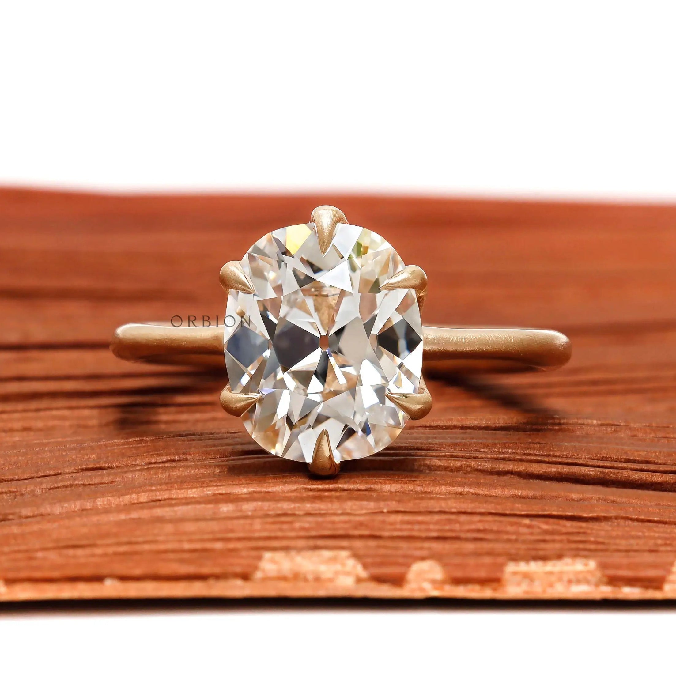Old mine cut moissanite engagement ring brushed matte yellow gold band