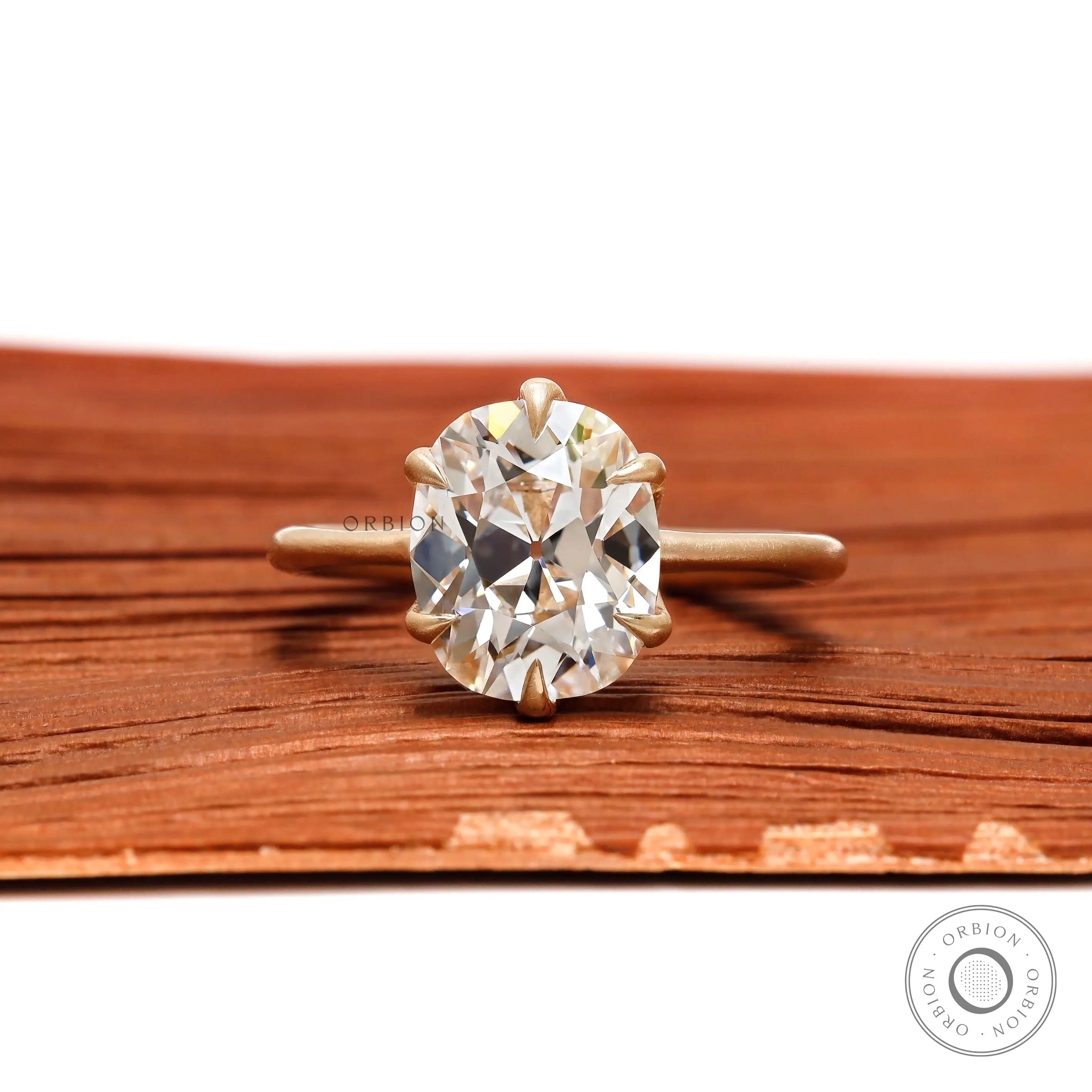 Old mine cut moissanite engagement ring brushed matte yellow gold band