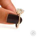 Four prong elongated cushion engagement ring