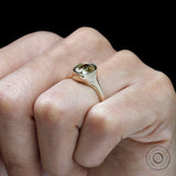 Simple yet bold signet style engagement ring in yellow gold