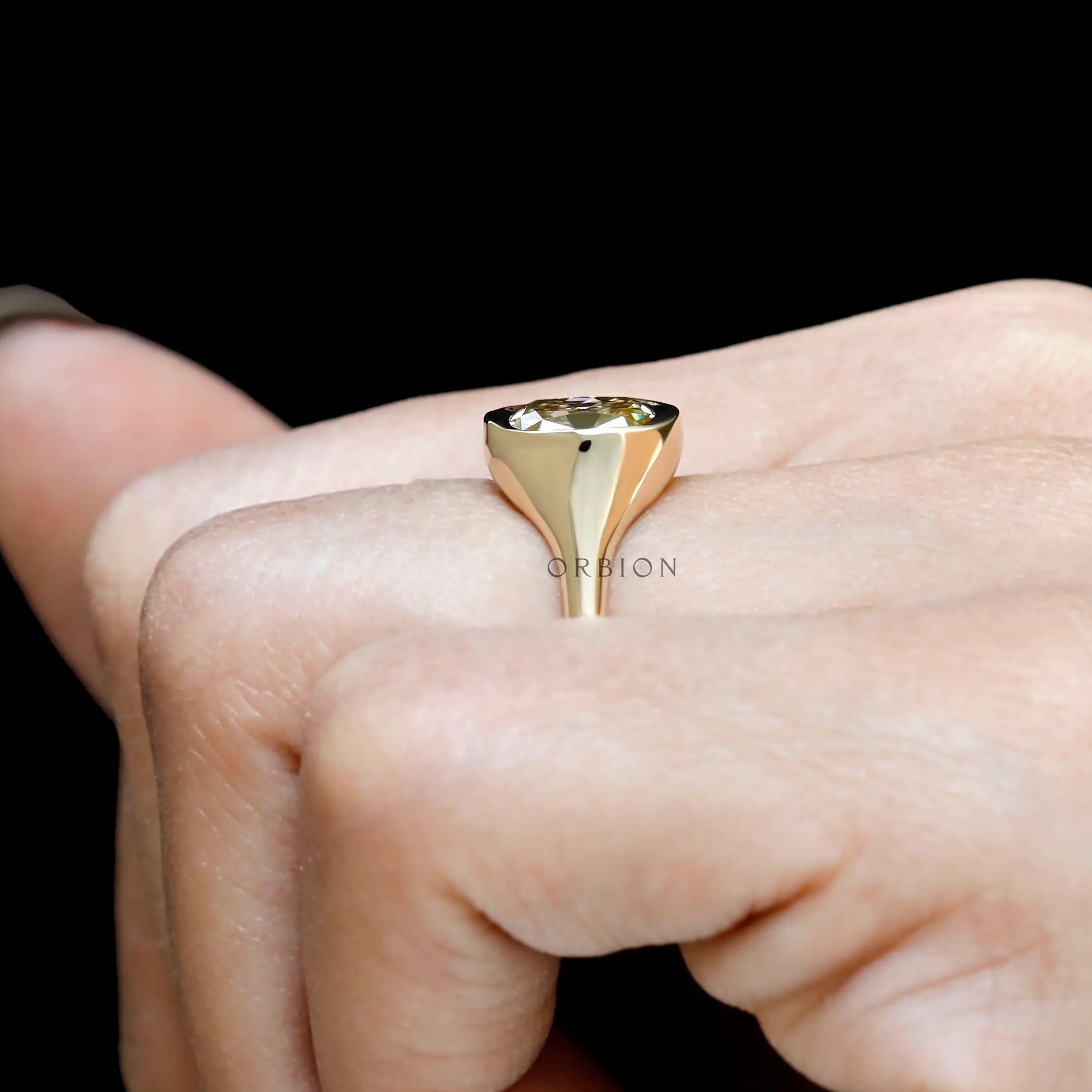 Elegant bezel set champagne moissanite ring yellow gold