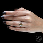 Vintage inspired champagne moissanite ring on finger