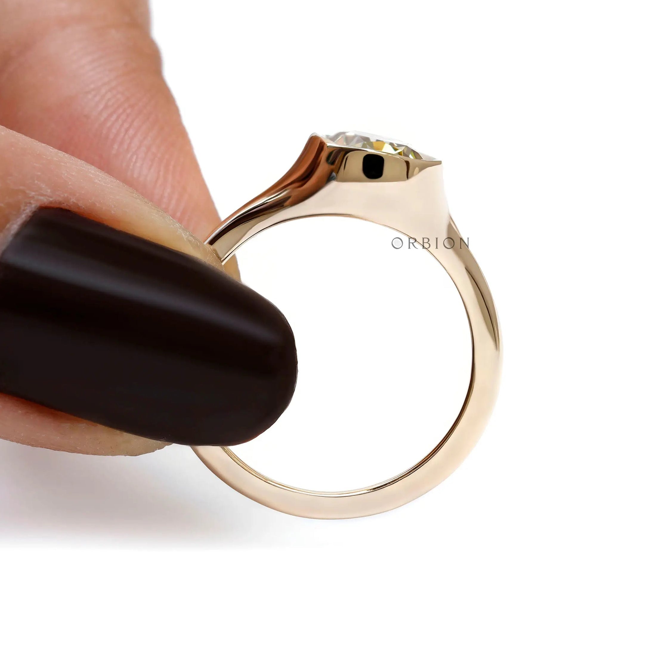 10k yellow gold bezel champagne moissanite ring