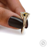 Elongated cushion old mine cut moissanite in smooth bezel