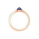 Minimalist 10K rose gold solitaire with deep blue center stone