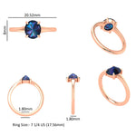 Deep blue oval gemstone solitaire ring with slim 1.8 mm band