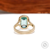Back view of elongated cushion green moissanite gold ring