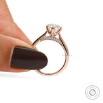 Vintage OEC round moissanite tulip setting engagement ring in 14K rose gold