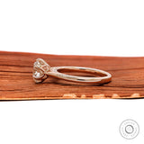 Old European Cut round lab diamond solitaire ring wood background