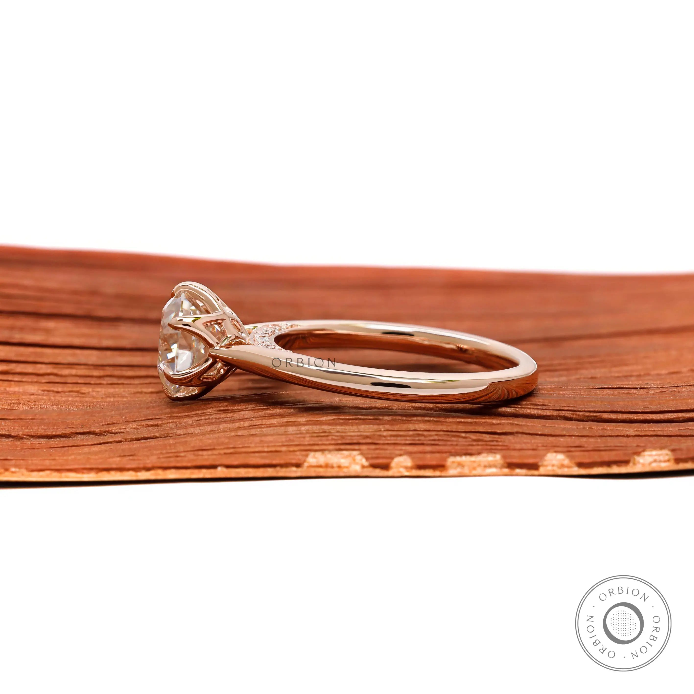 Old European Cut round lab diamond solitaire ring wood background