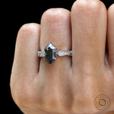 Color moissanite engagement ring close up