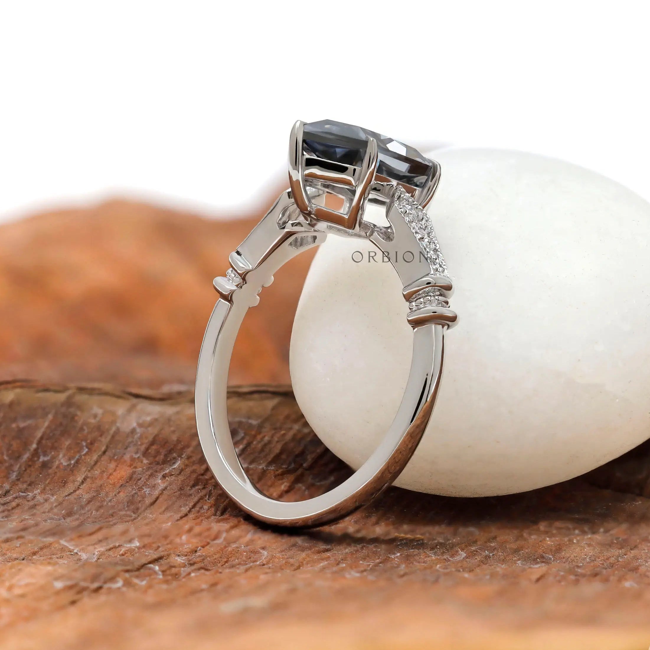 Grey moissanite with round accent diamonds