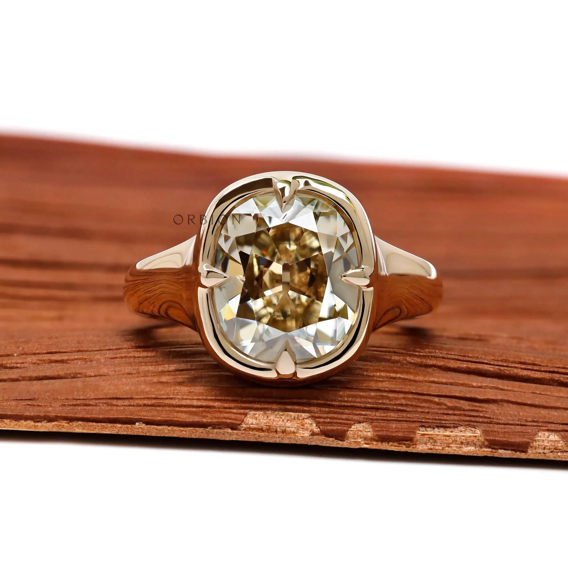 Elongated cushion champagne moissanite chunky engagement ring in 14k yellow gold