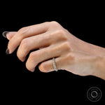 Elegant triple row diamond band on hand
