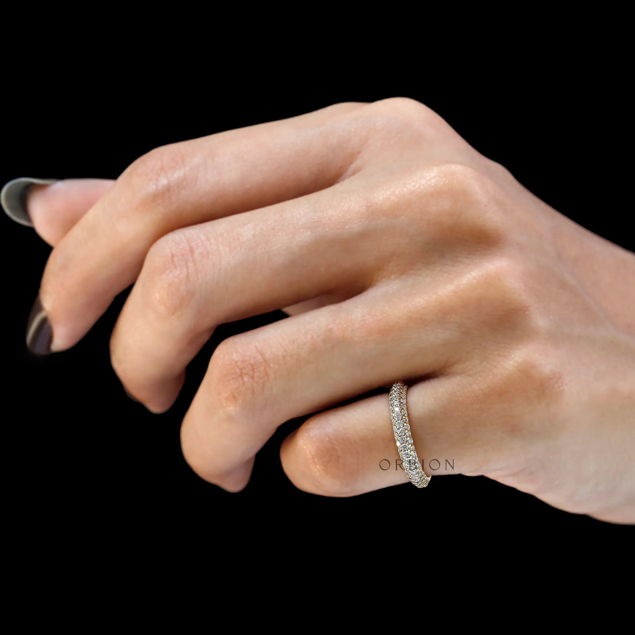 Elegant triple row diamond band on hand