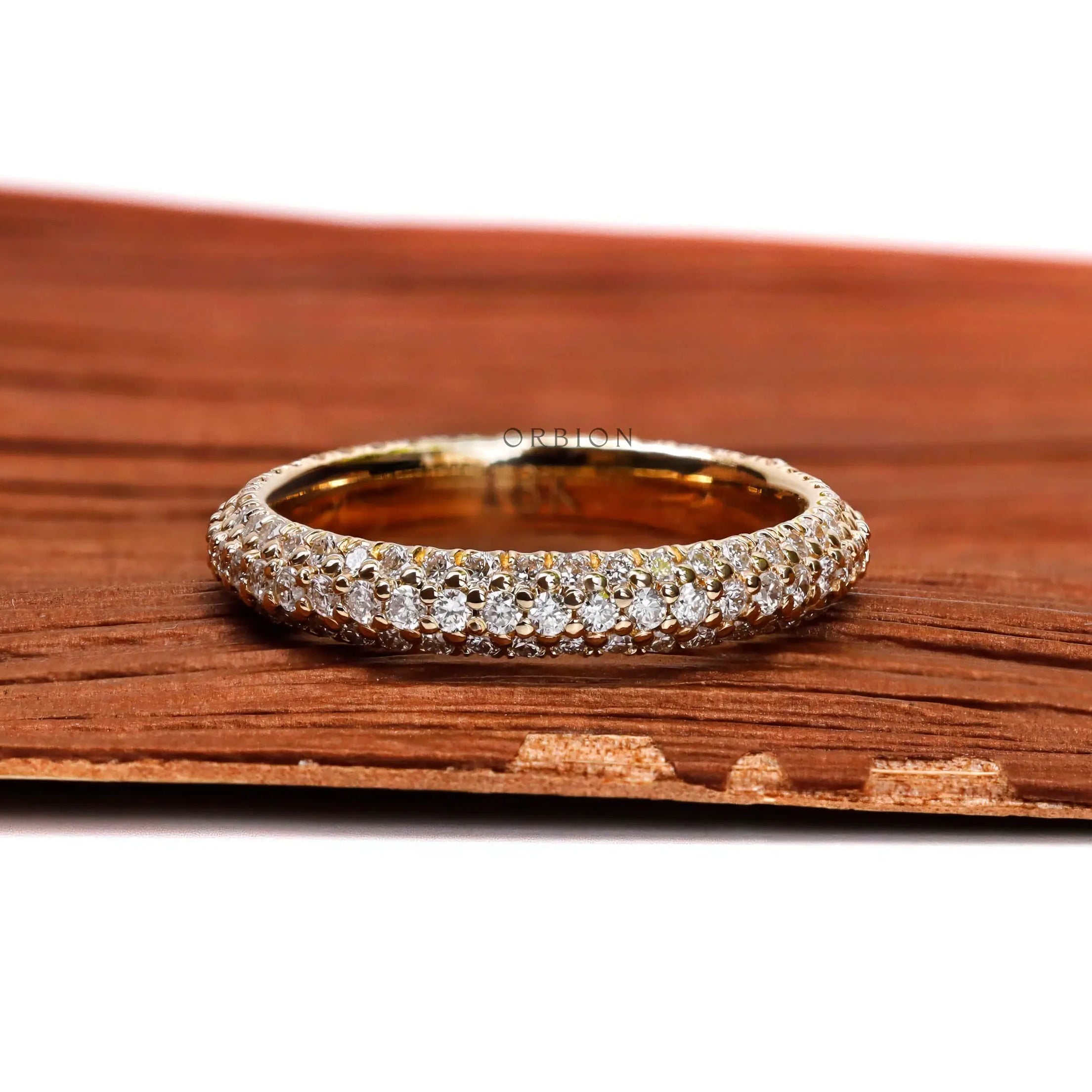 Three row diamond full eternity band in 18K yellow gold