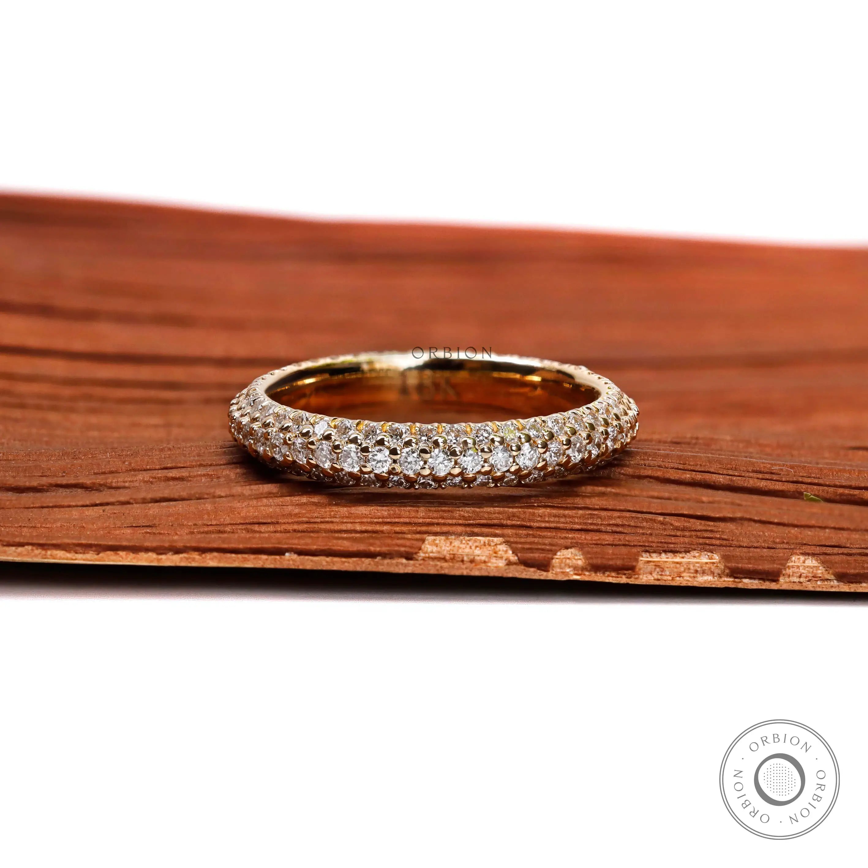 Three row diamond full eternity band in 18K yellow gold