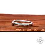 Thin white gold nesting wedding band side view