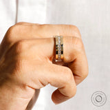 Mens yellow gold lab diamond band on finger close up
