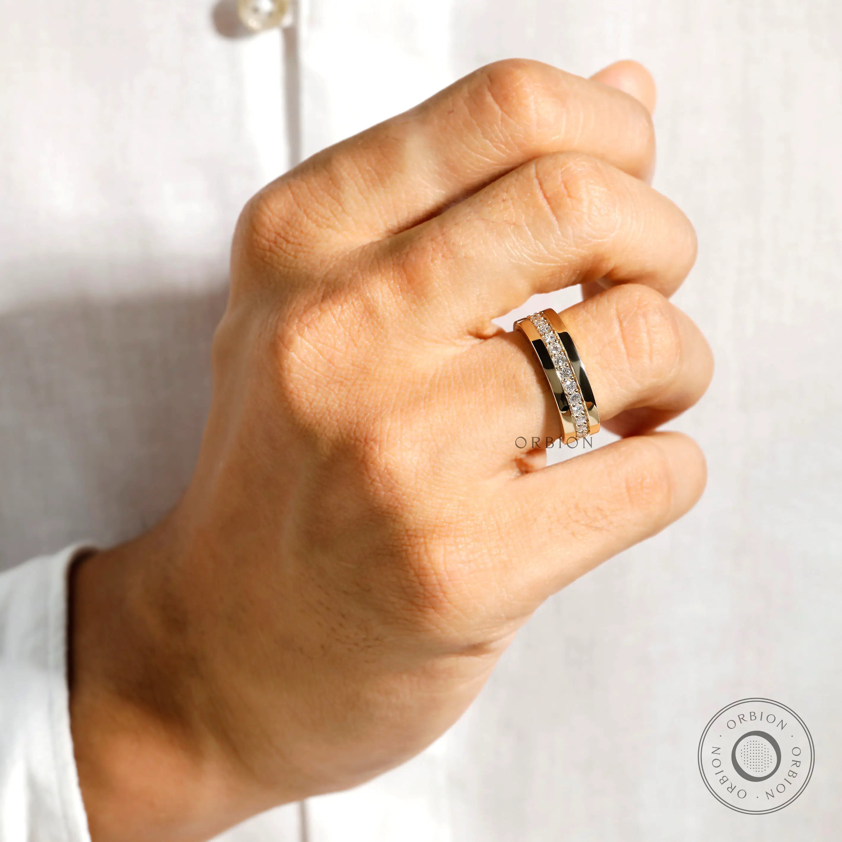 Contemporary 18K gold eternity wedding band for him