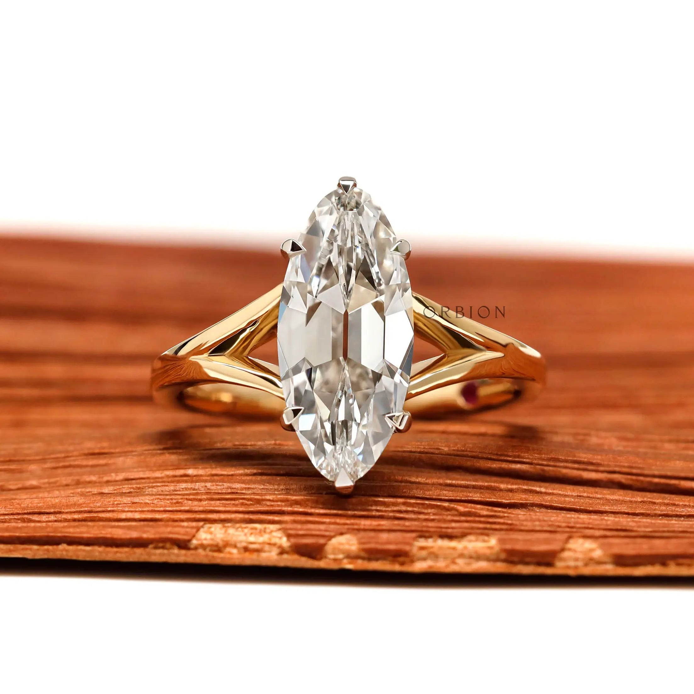 Antique moval cut engagement ring split shank two tone gold