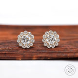Round halo lab diamond stud earrings in yellow gold close-up