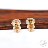 Back view of halo diamond stud earrings with secure closure