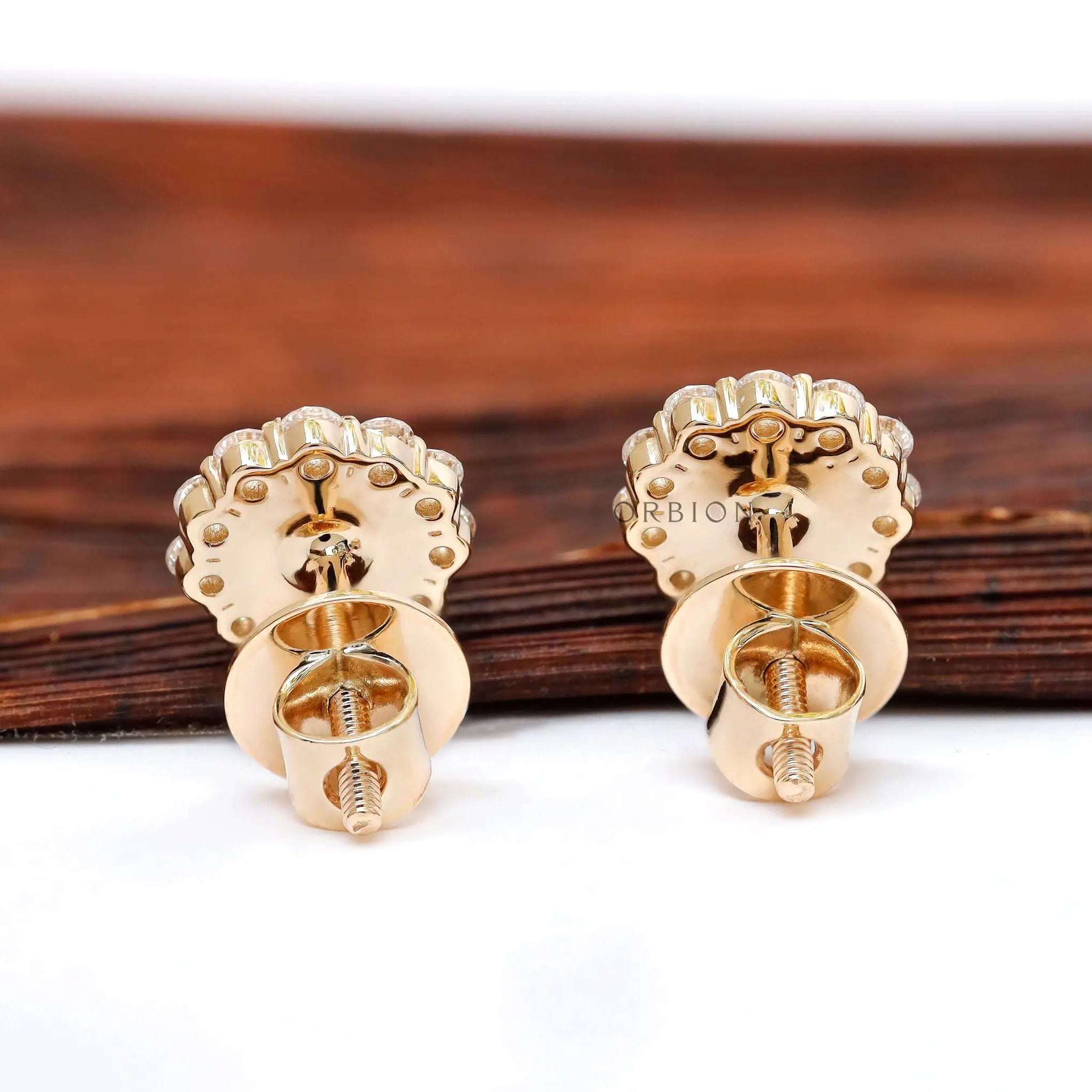Back view of halo diamond stud earrings with secure closure