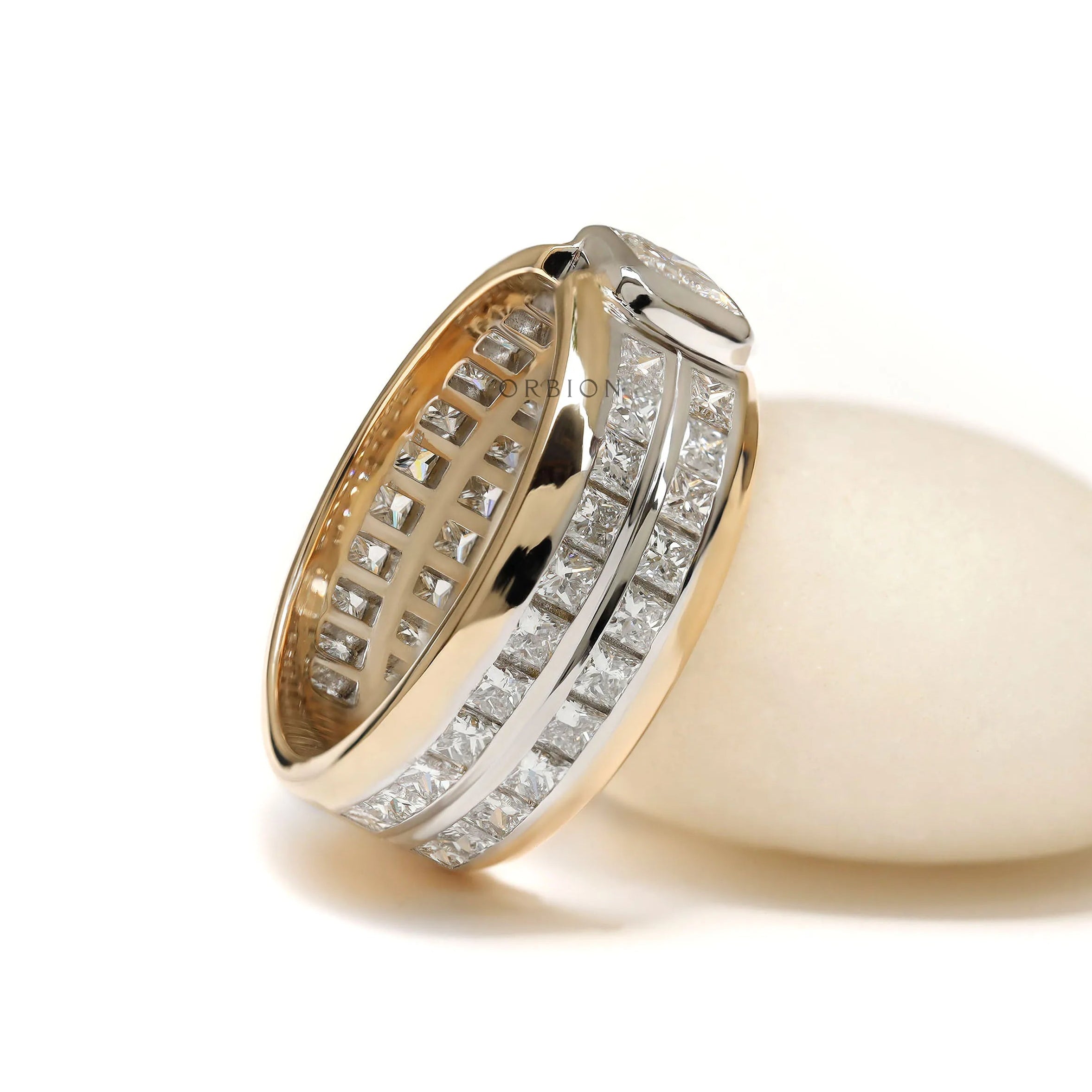 Mens diamond band ring in two tone gold with mixed radiant and princess stones