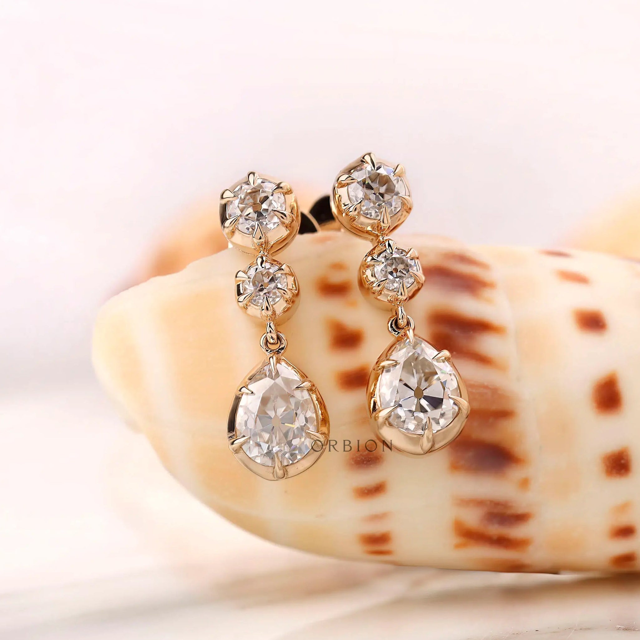 Vintage pear drop earrings with moissanite stones in 10K yellow gold