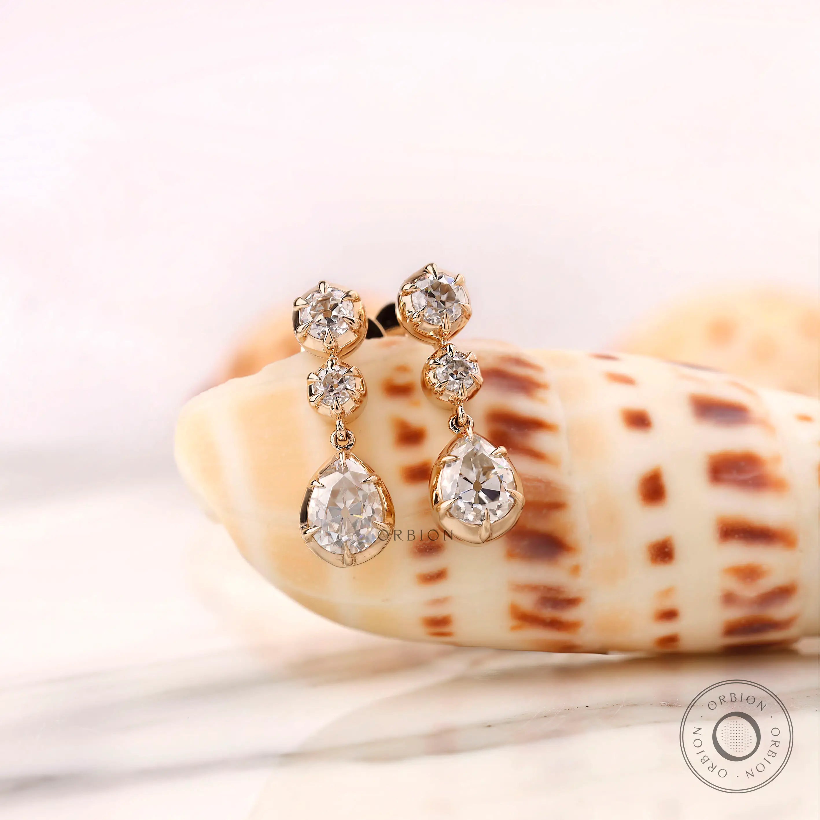Vintage pear drop earrings with moissanite stones in 10K yellow gold