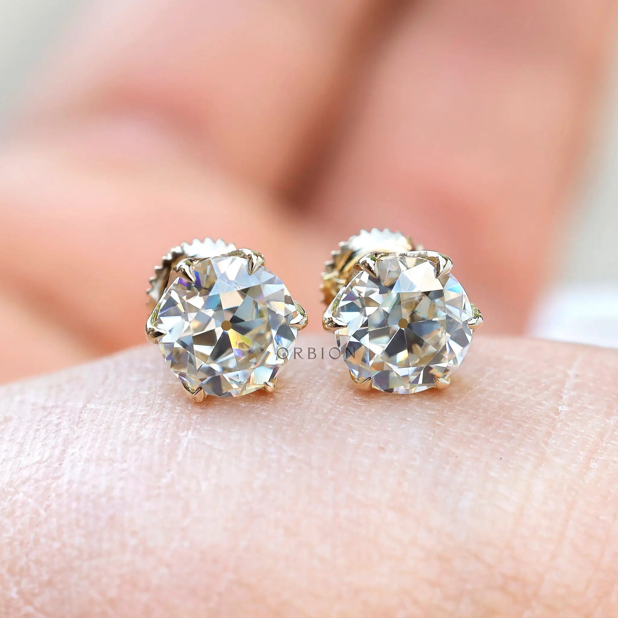 10K yellow gold round moissanite stud earrings glossy finish