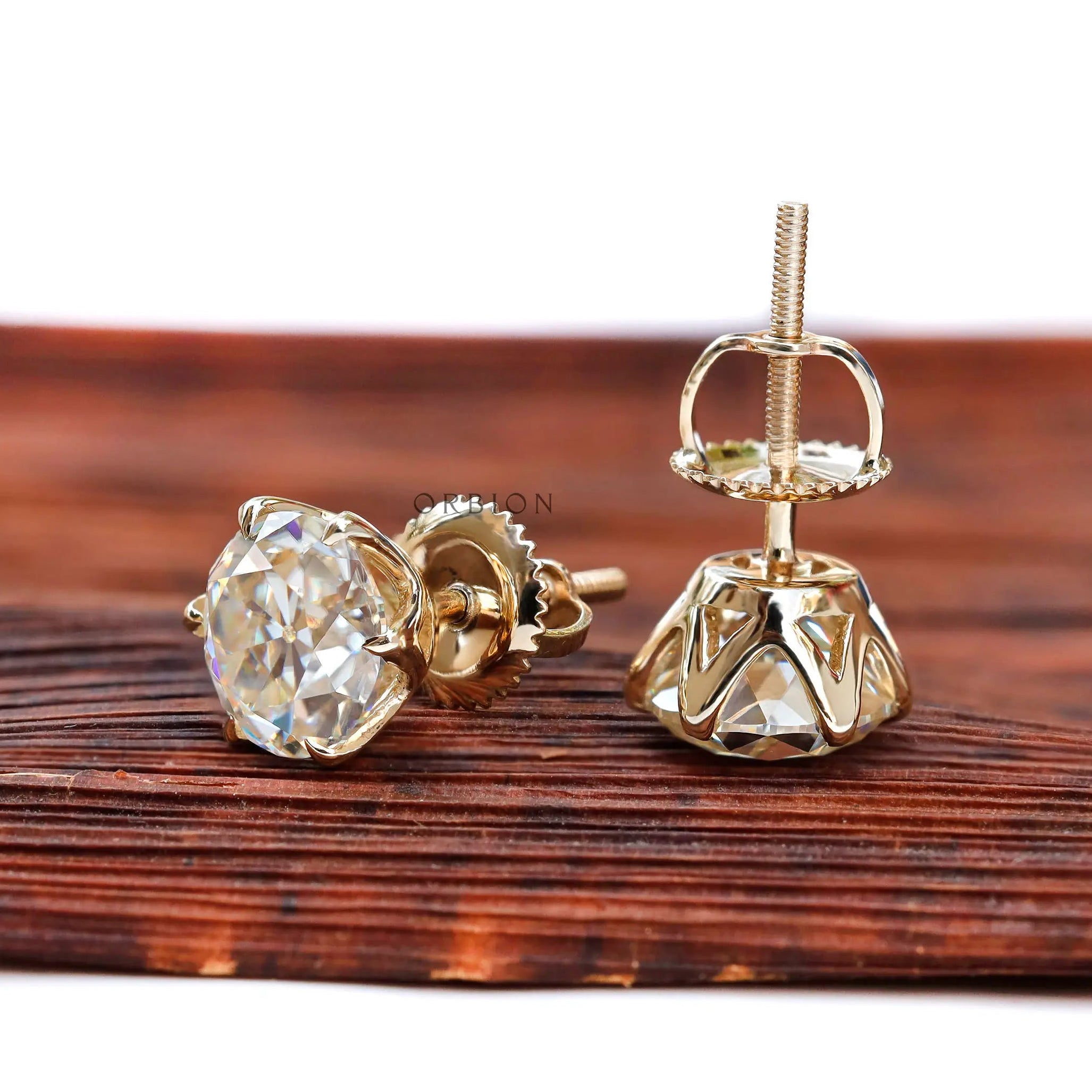 Vintage Georgian inspired moissanite stud earrings close up