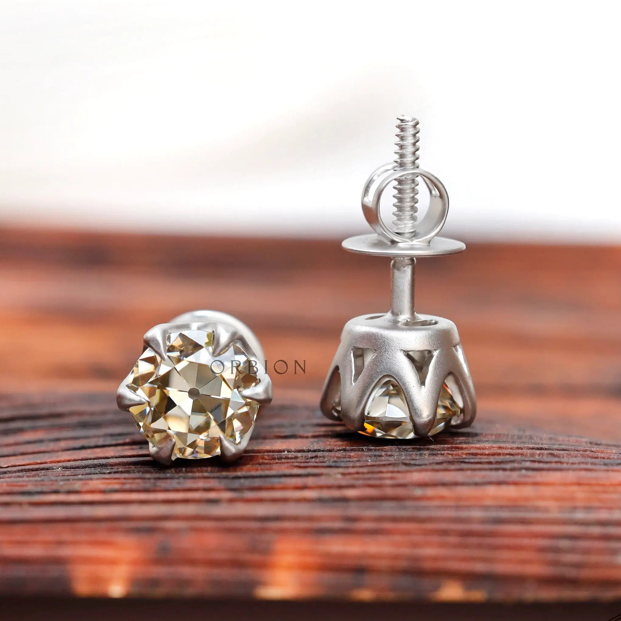 10K white gold champagne moissanite stud earrings with matte finish
