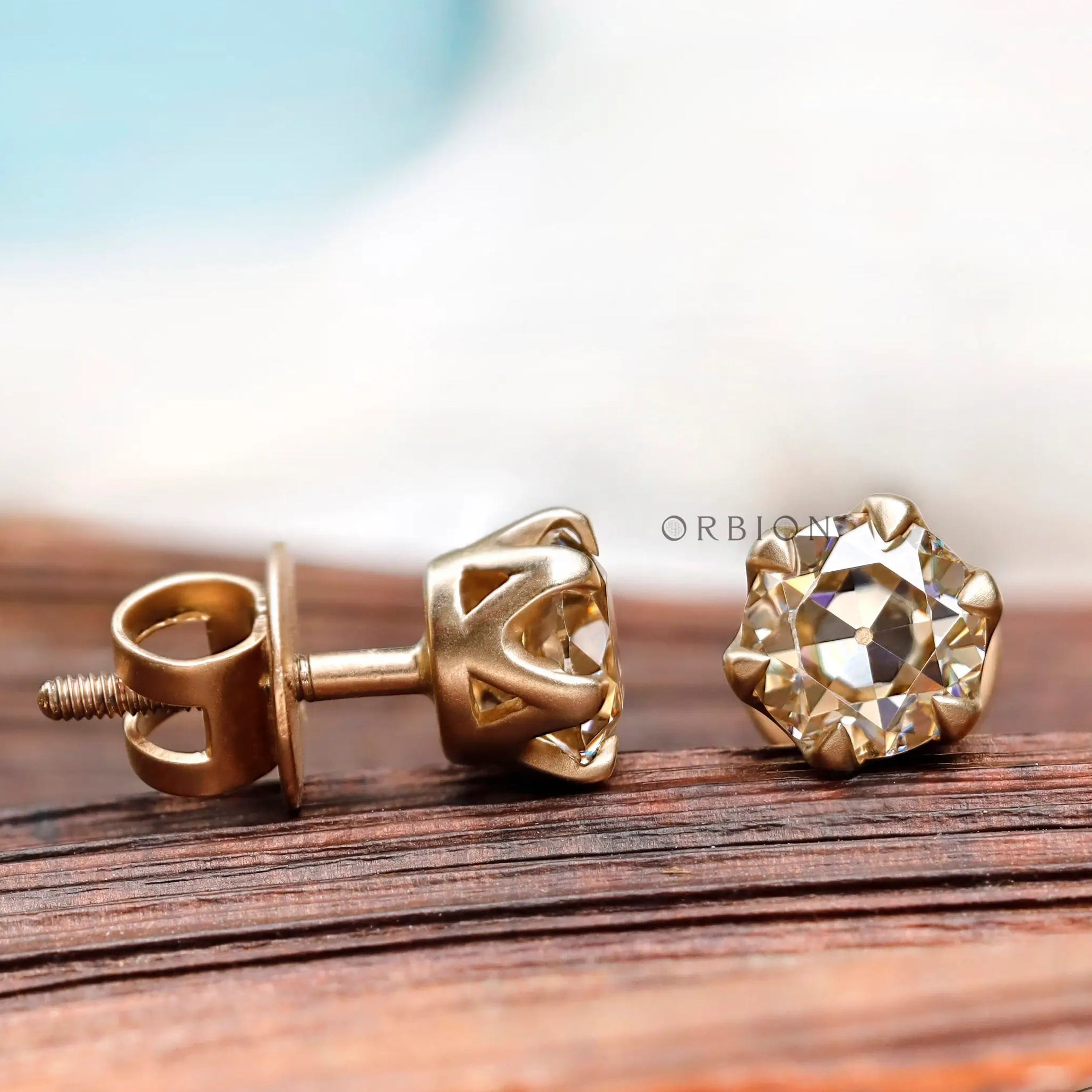 Light champagne old european cut moissanite stud earrings elegant design