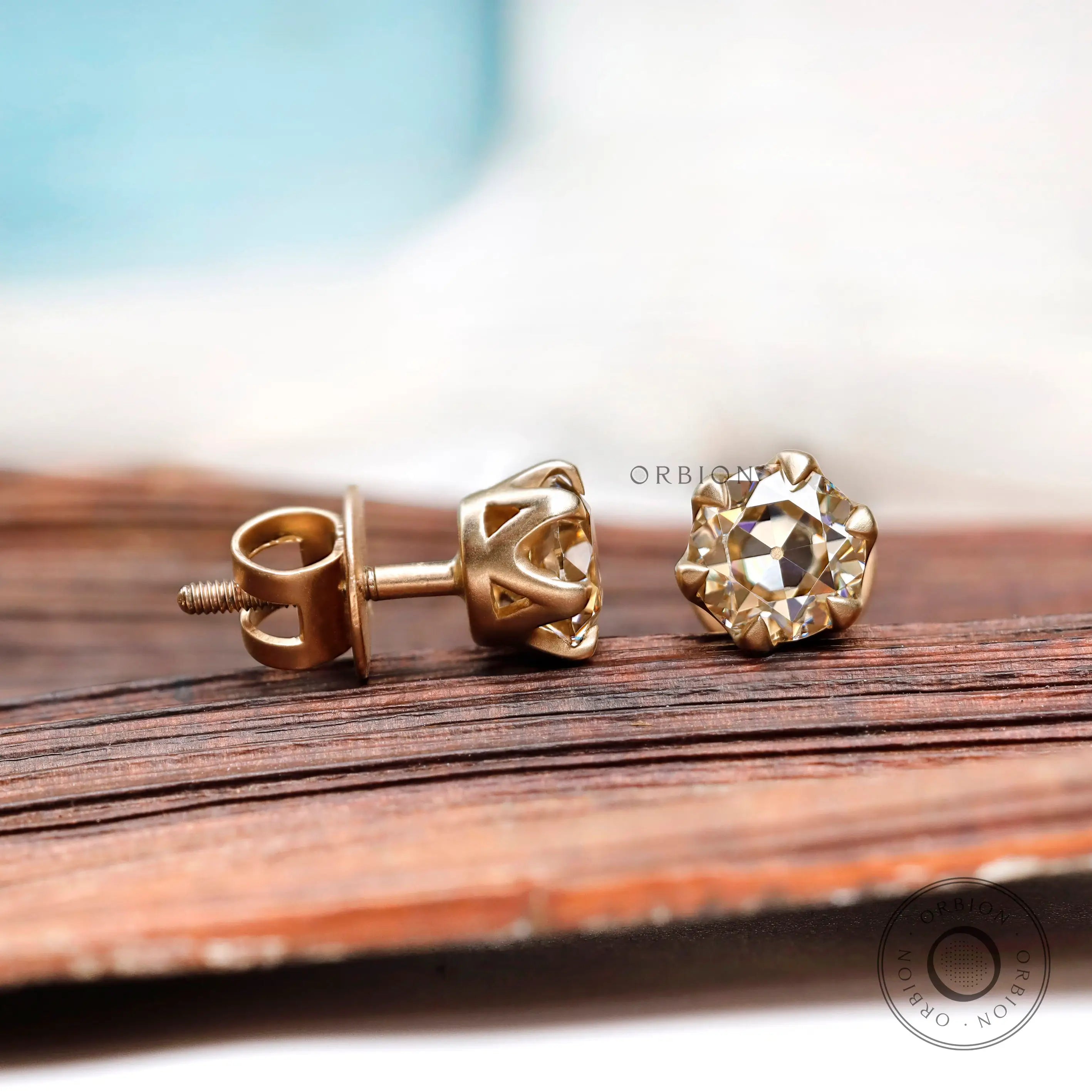 Light champagne old european cut moissanite stud earrings elegant design
