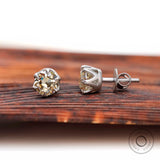 Classic round moissanite stud earrings close up detail