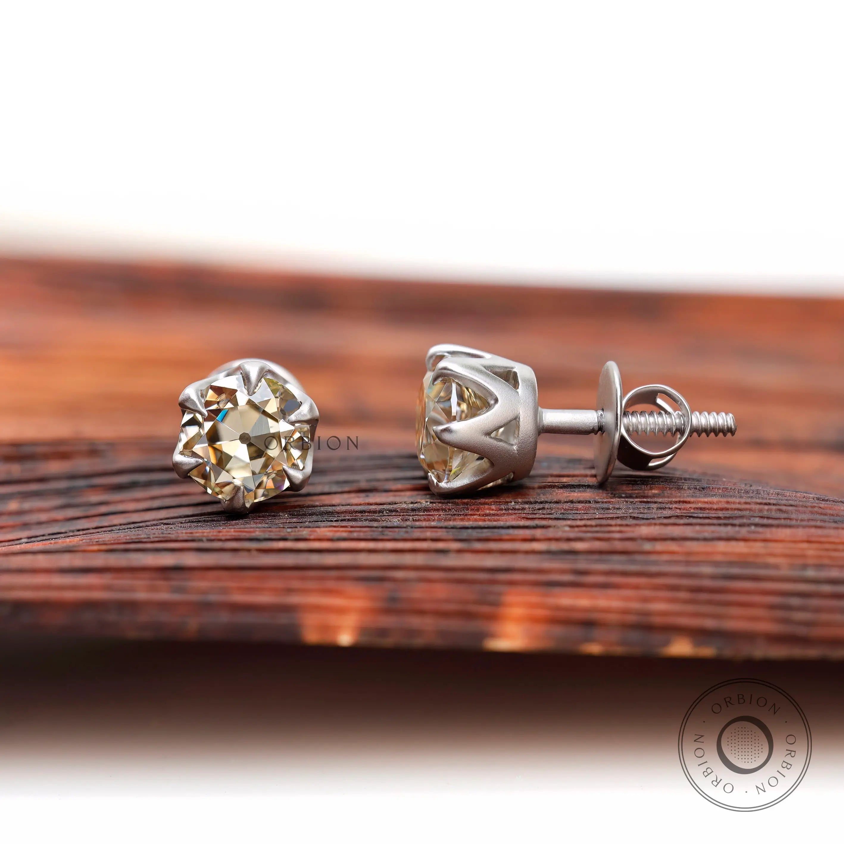 Classic round moissanite stud earrings close up detail