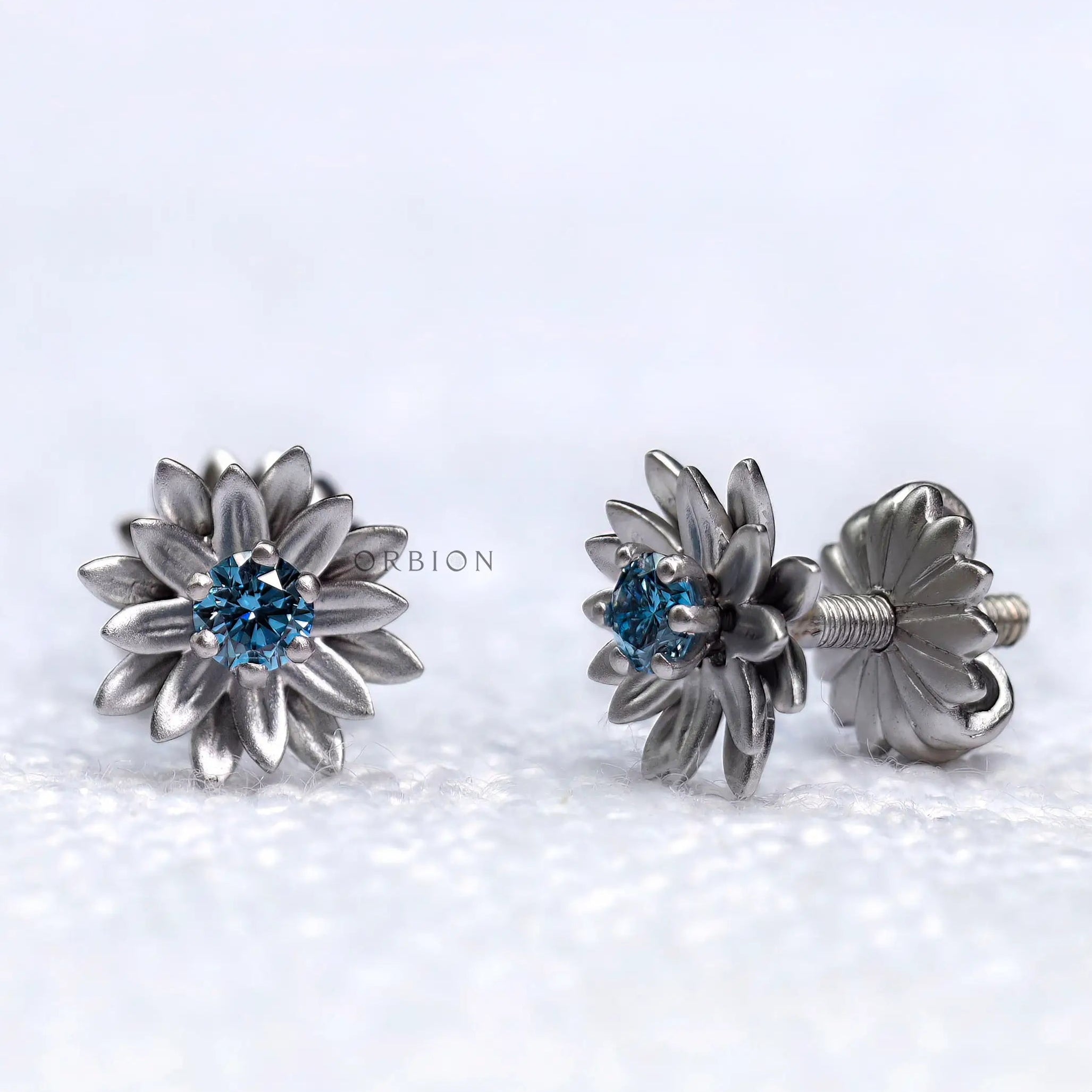 Floral lotus inspired lab diamond earrings with matte white gold finish
