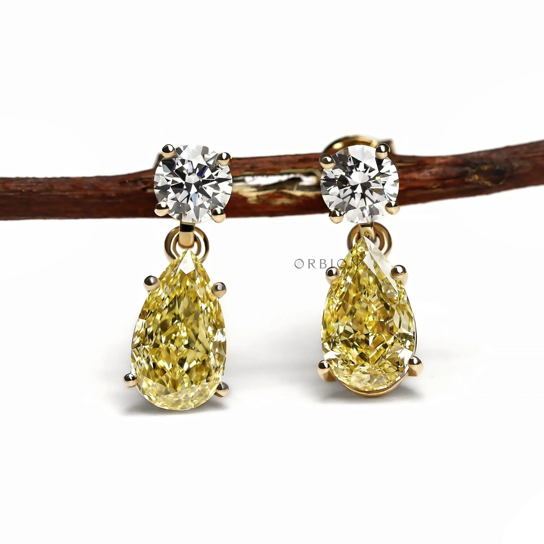 Teardrop lab diamond dangle drop earrings with round and pear yellow diamonds in 10k yellow gold