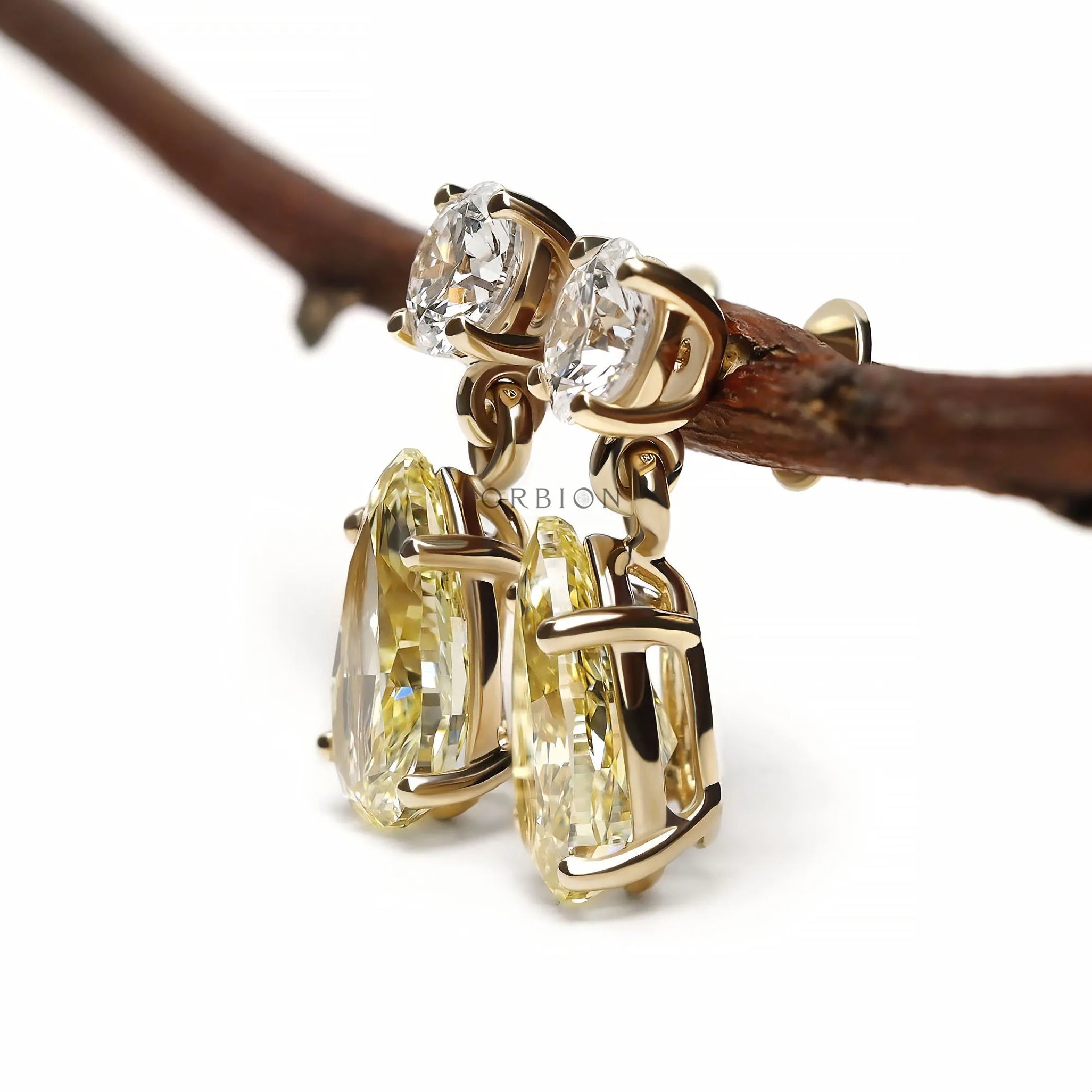 Two stone lab diamond earrings with teardrop dangle style, round and pear yellow diamond accents
