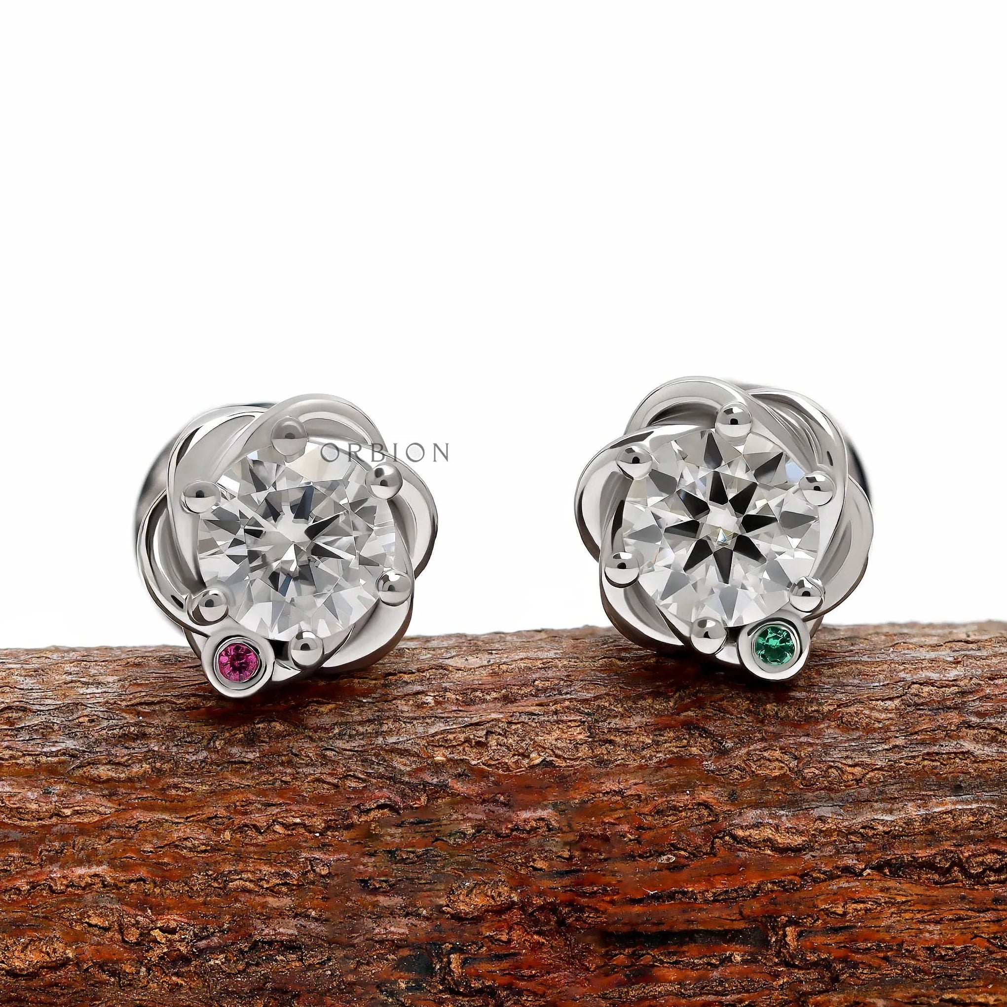14k white gold round diamond stud earrings featuring a unique braided setting and modern wedding jewelry style